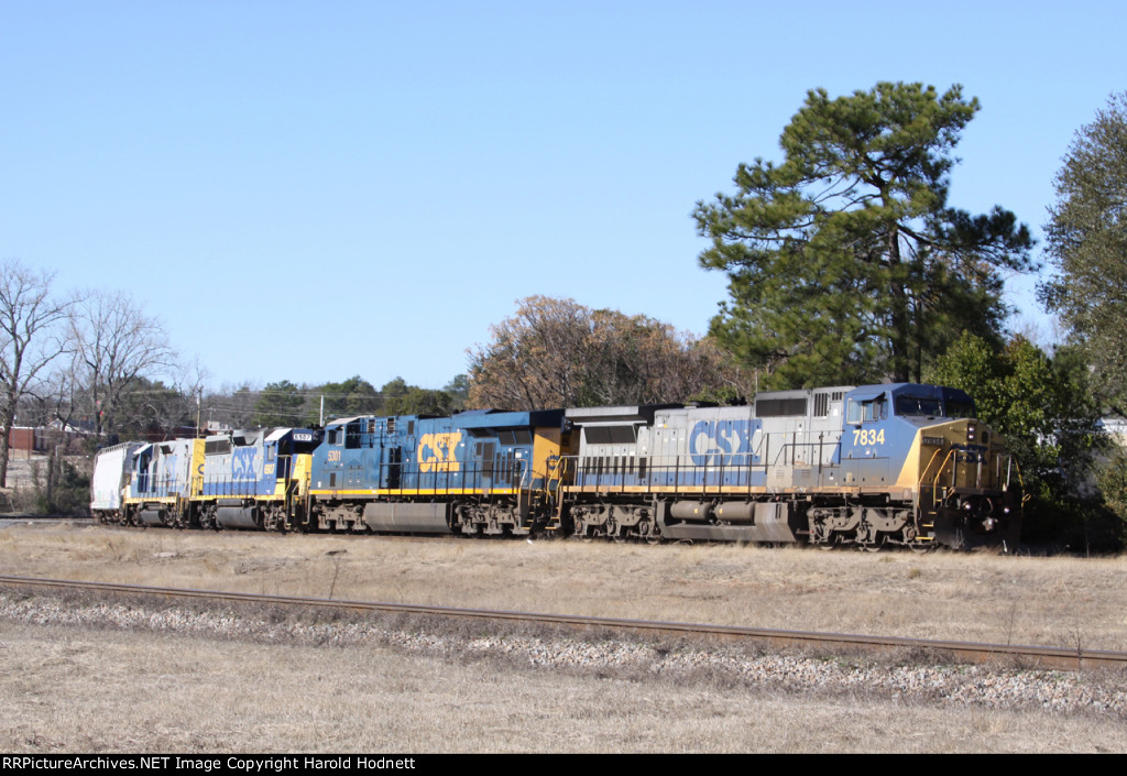 CSX 7834 leads train F768 up track 1 towards the yard